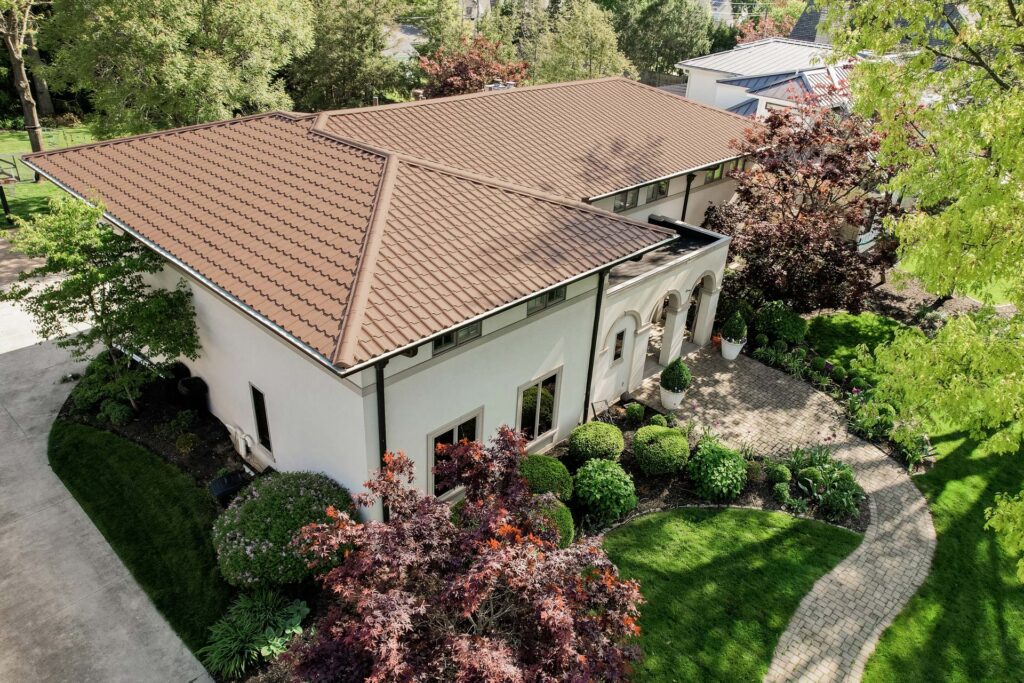 ProVia barrel tile metal roofing in Terracotta